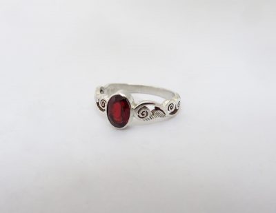 Deep red and sparkly faceted garnet